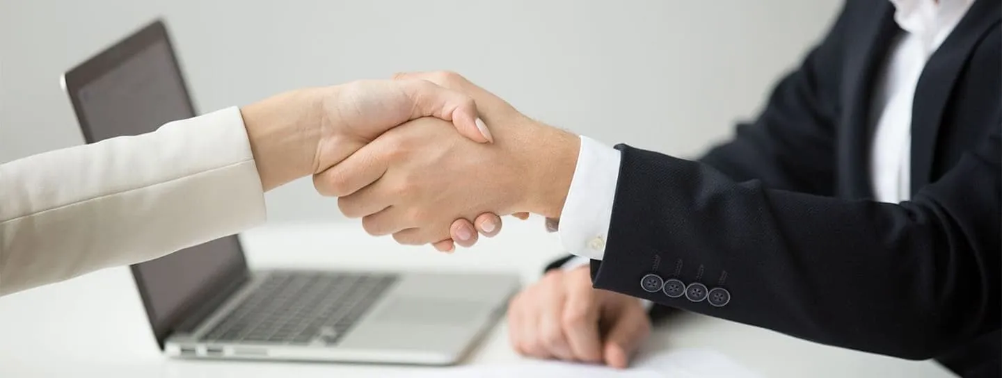 CEO & Entrepreneur Business Interview Collaboration - Great People Interview Series Business handshake between professionals representing CEO and entrepreneur interviews in the Great People Interview Series featuring industry leaders and decision-makers.