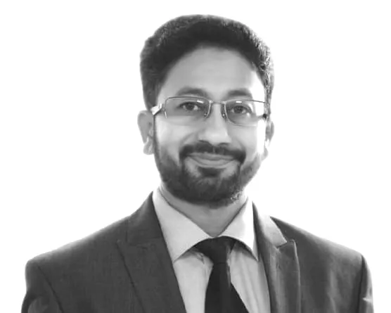 Sachin Parekh Director at London School of Digital Business UK wearing suit and glasses professional headshot portrait